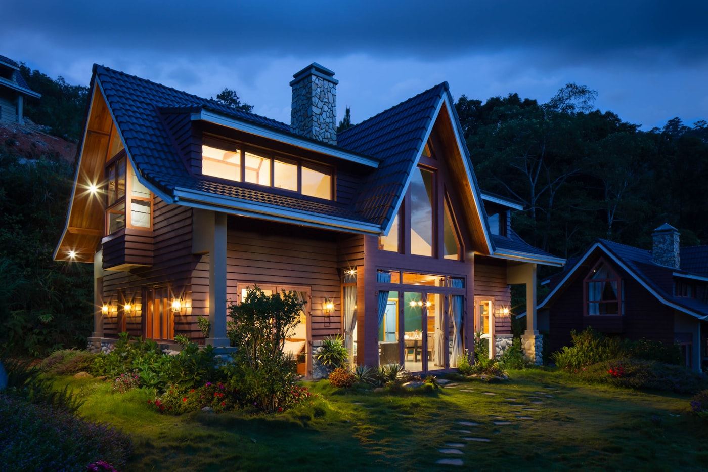 Home exterior with roofline and landscaping